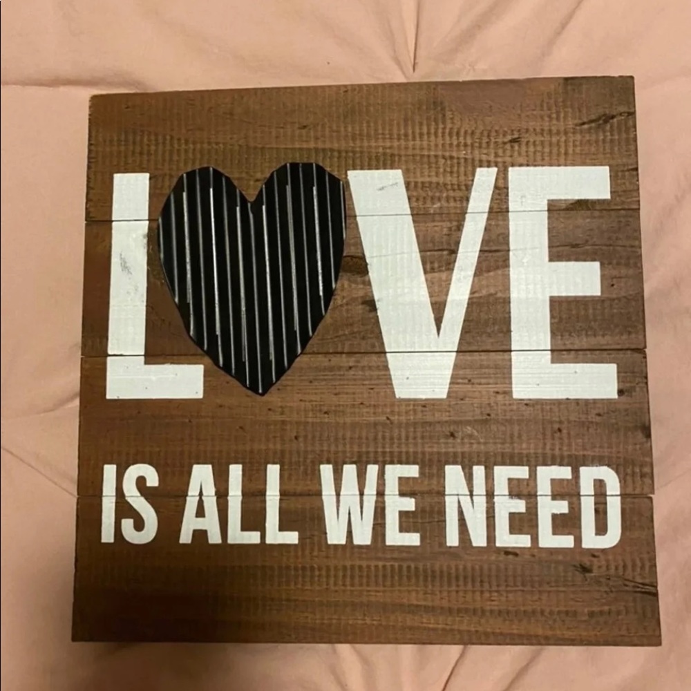 "Love Is All We Need" Industrial sign